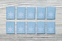 10 vävda etiketter ”snöflinga” - Artikelnummer 8706